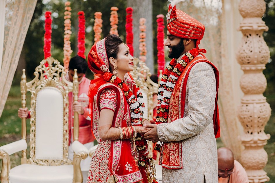 Indian bride and groom in traditional attire at their wedding