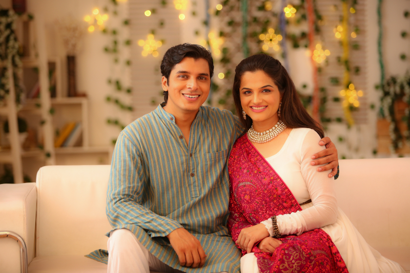 Happy couple in traditional Indian attire - Go For Desi